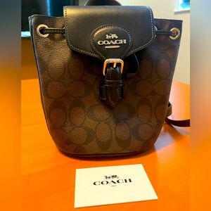 Coach mini backpack.